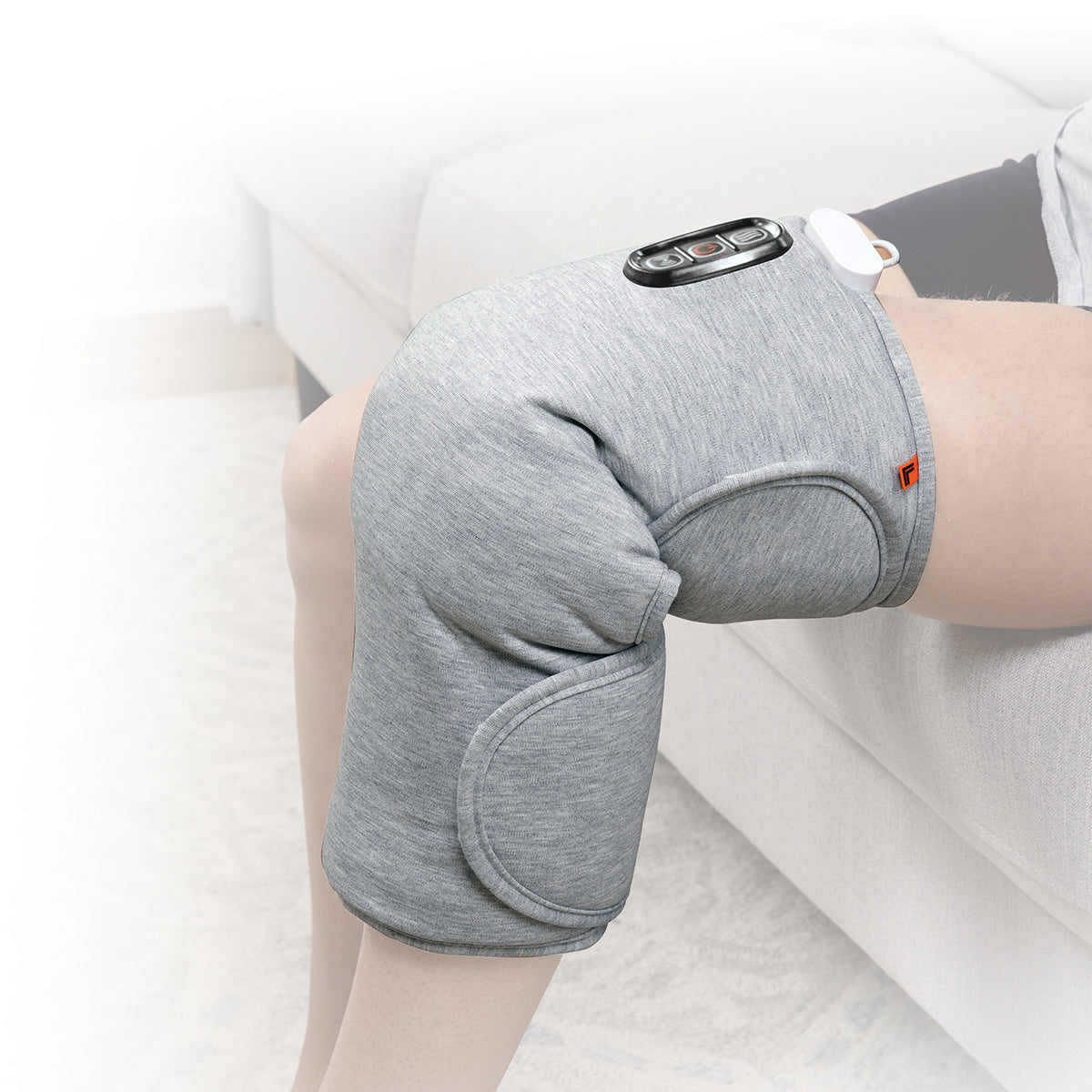 Calming Heat™ Charcoal + Copper Infused Massaging Knee Wrap by Sharper Image