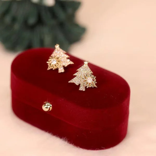 Pendientes giratorios de árbol de Navidad con copos de nieve