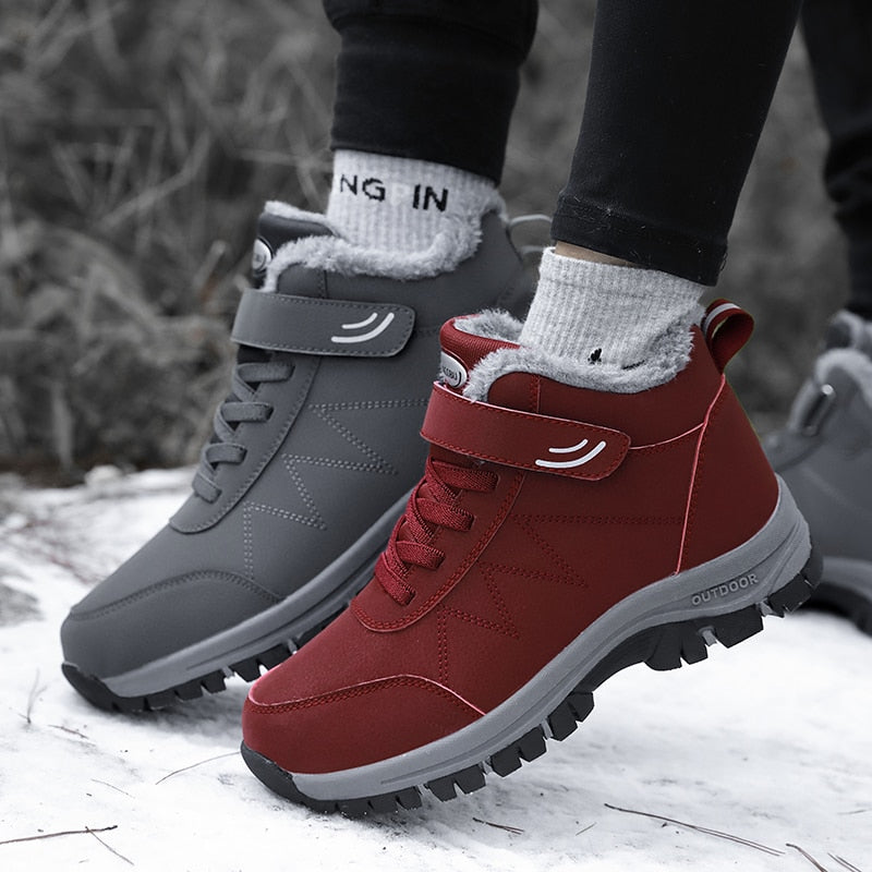 Botas de nieve impermeables para hombre y mujer, botines de cuero